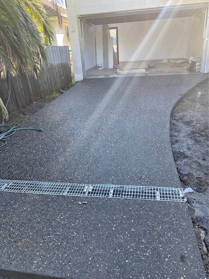 exposed aggregate driveway completed by Naples Concrete Solutions pros